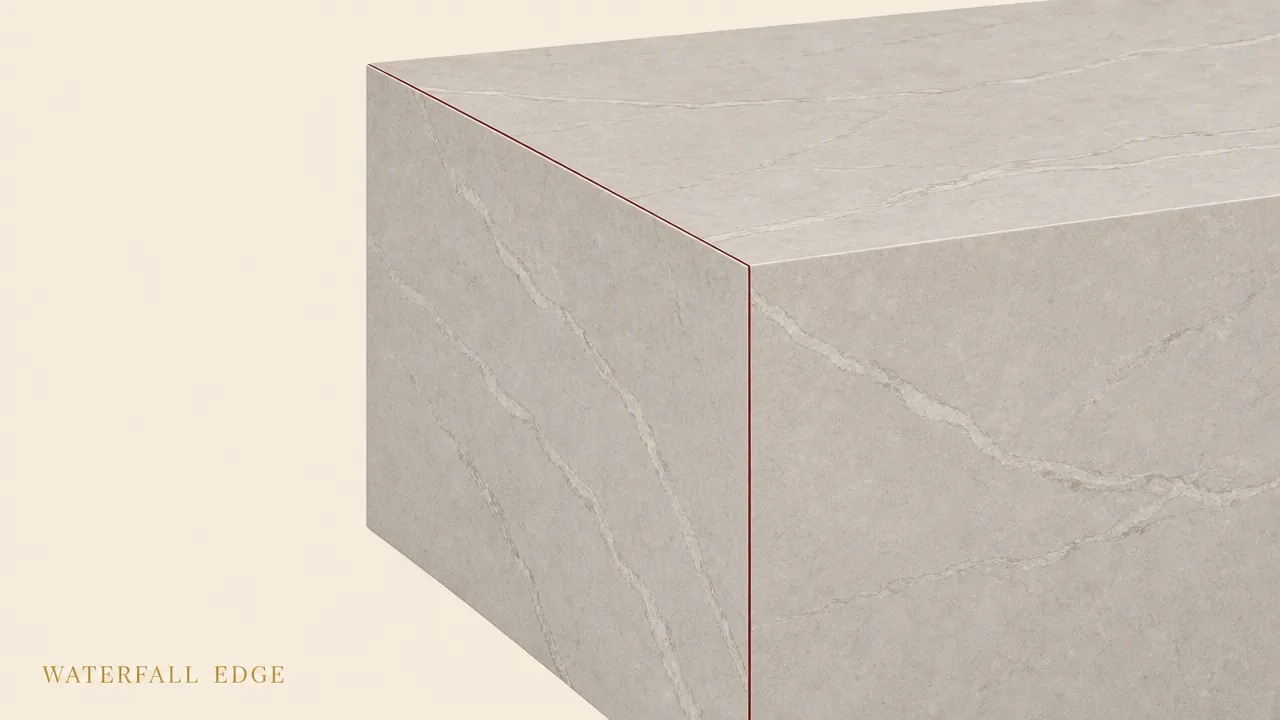 Illustration of a waterfall edge on a stone island, showing the mitered corner where the countertop surface and veining flow continuously down the vertical side